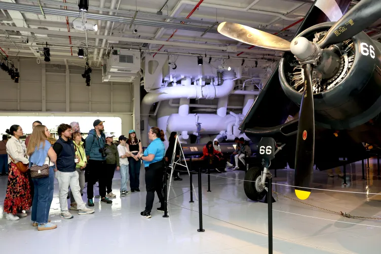 Guests on a highlight tour of the Intrepid Museum.