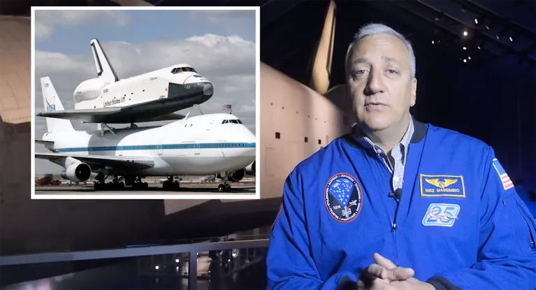 Astronaut Mike Massimino with an inset photo of the Space Shuttle Enterprise on the airplane that brought it to the Museum.