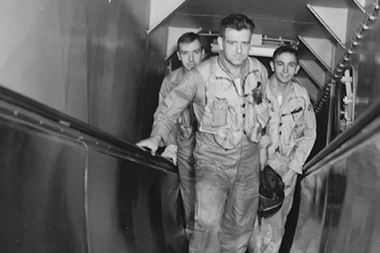 image of crew members aboard the uss intrepid
