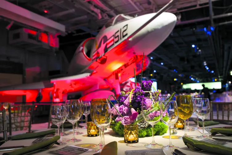 Beautiful table setting with an aircraft in the background