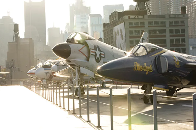 airplanes on top of the uss intrepid museum