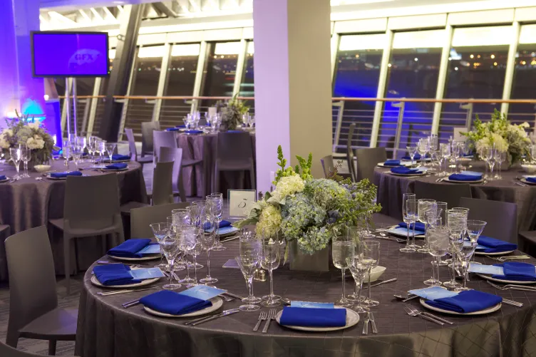 Tables set up for a reception in the Great Hall