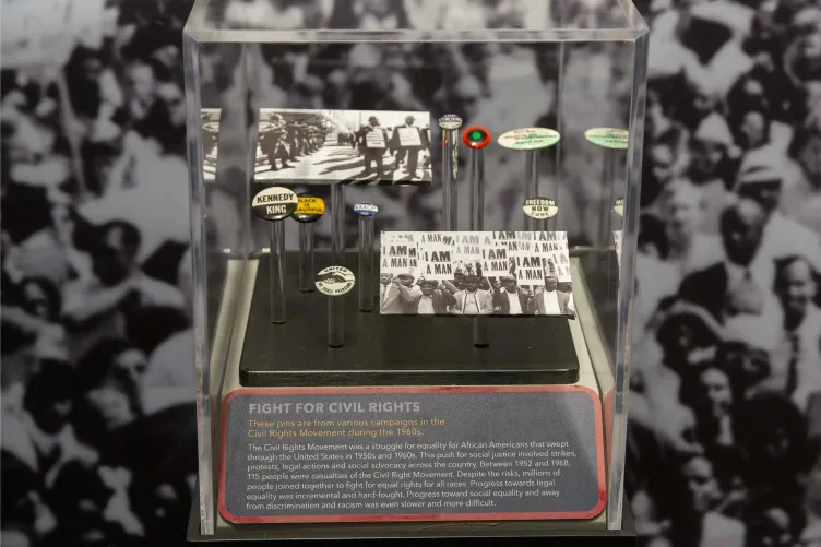 Display of Apollo-era civil rights pins