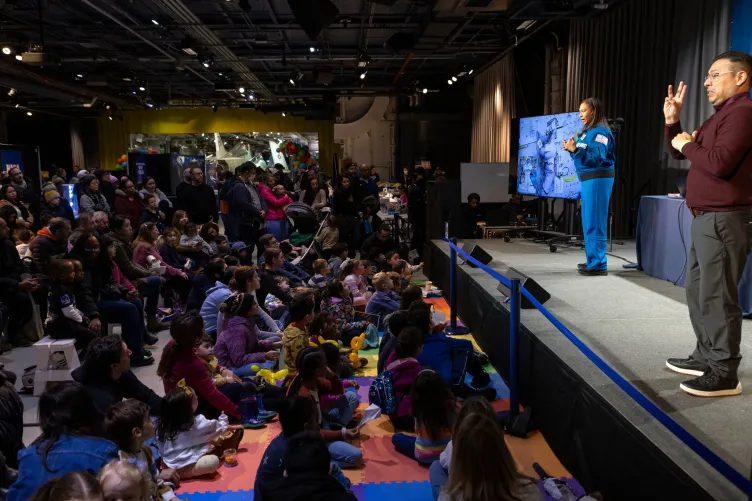 "NASA astronaut Jeanette Epps presenting on stage during Kids Week.