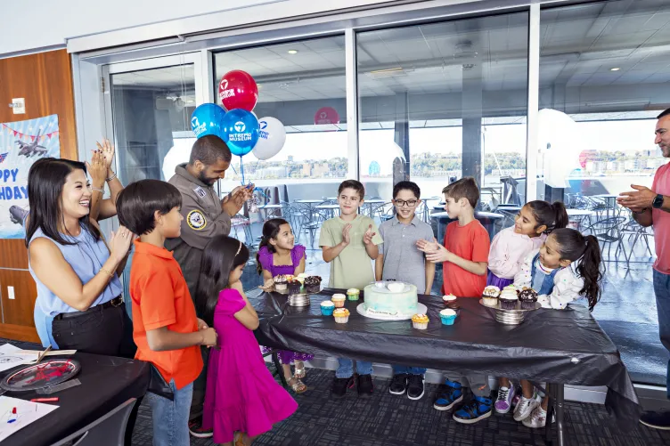 Birthday party group on the Intrepid Museum.