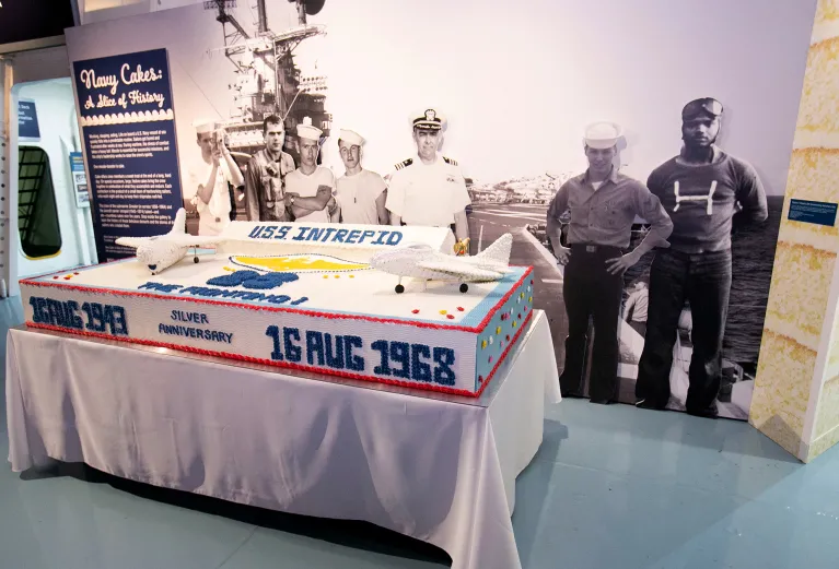 A large cake with airplanes on it