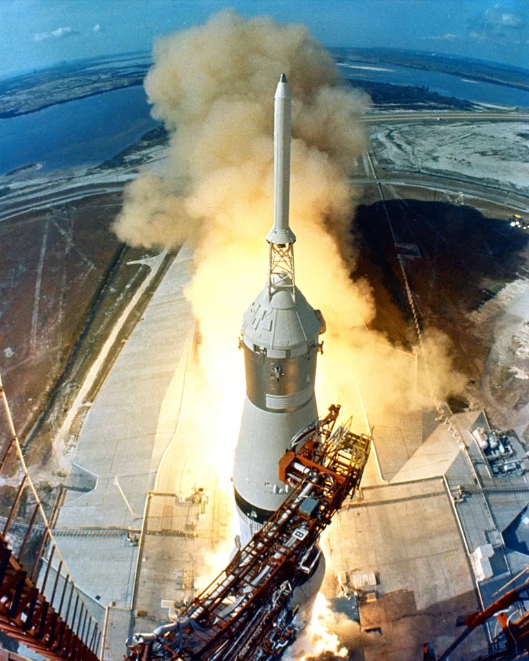 Space rocket launching into the sky.
