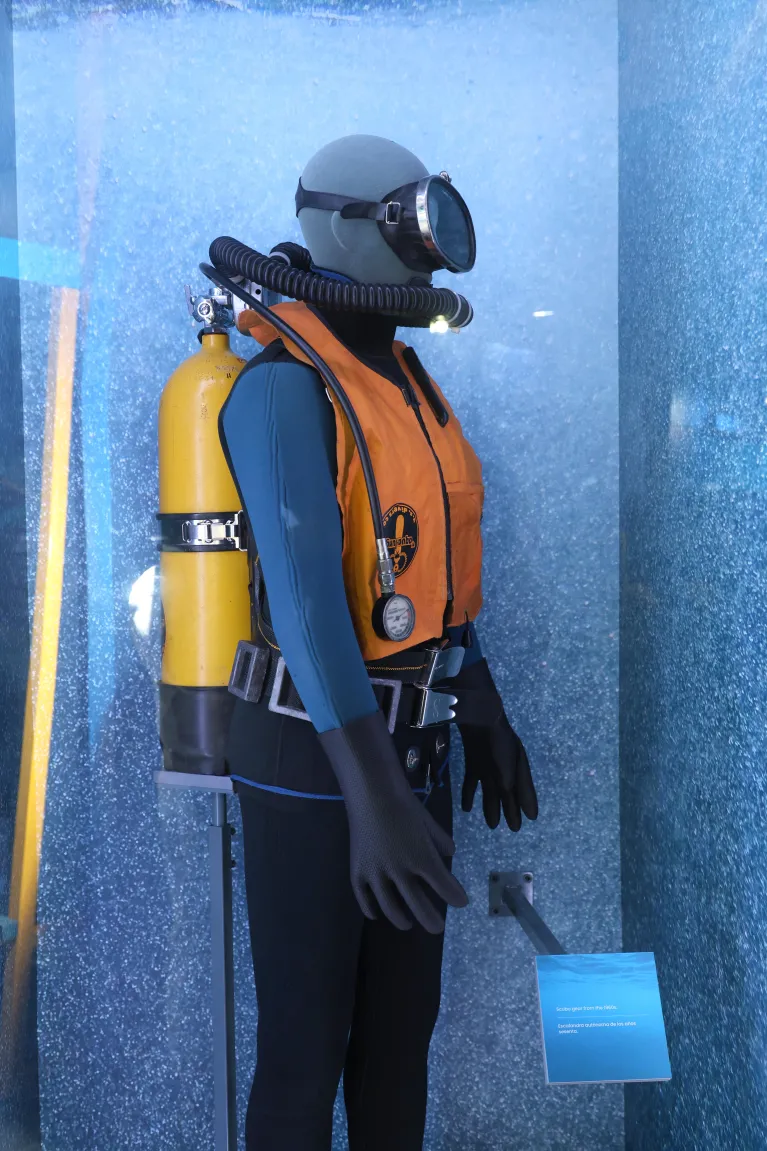 Archaeology suit displayed in a case at the Mysteries from the Deep: Exploring Underwater Archaeology exhibition at the Intrepid Museum.